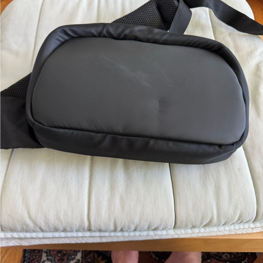 Black large fanny back with cushioned strap